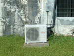 Installation of one of the three air conditioners at the Peleliu War Musuem